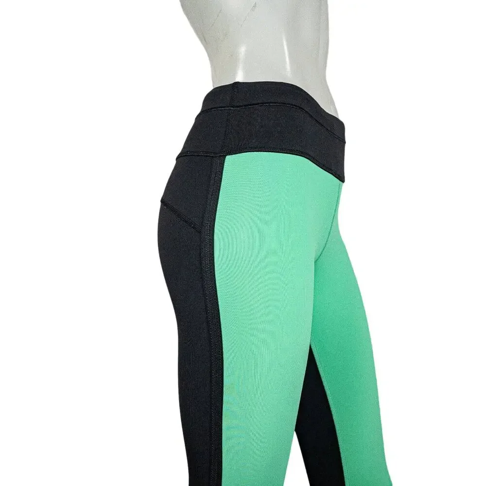 Lululemon two tone Green Black Leggings mesh side size 4